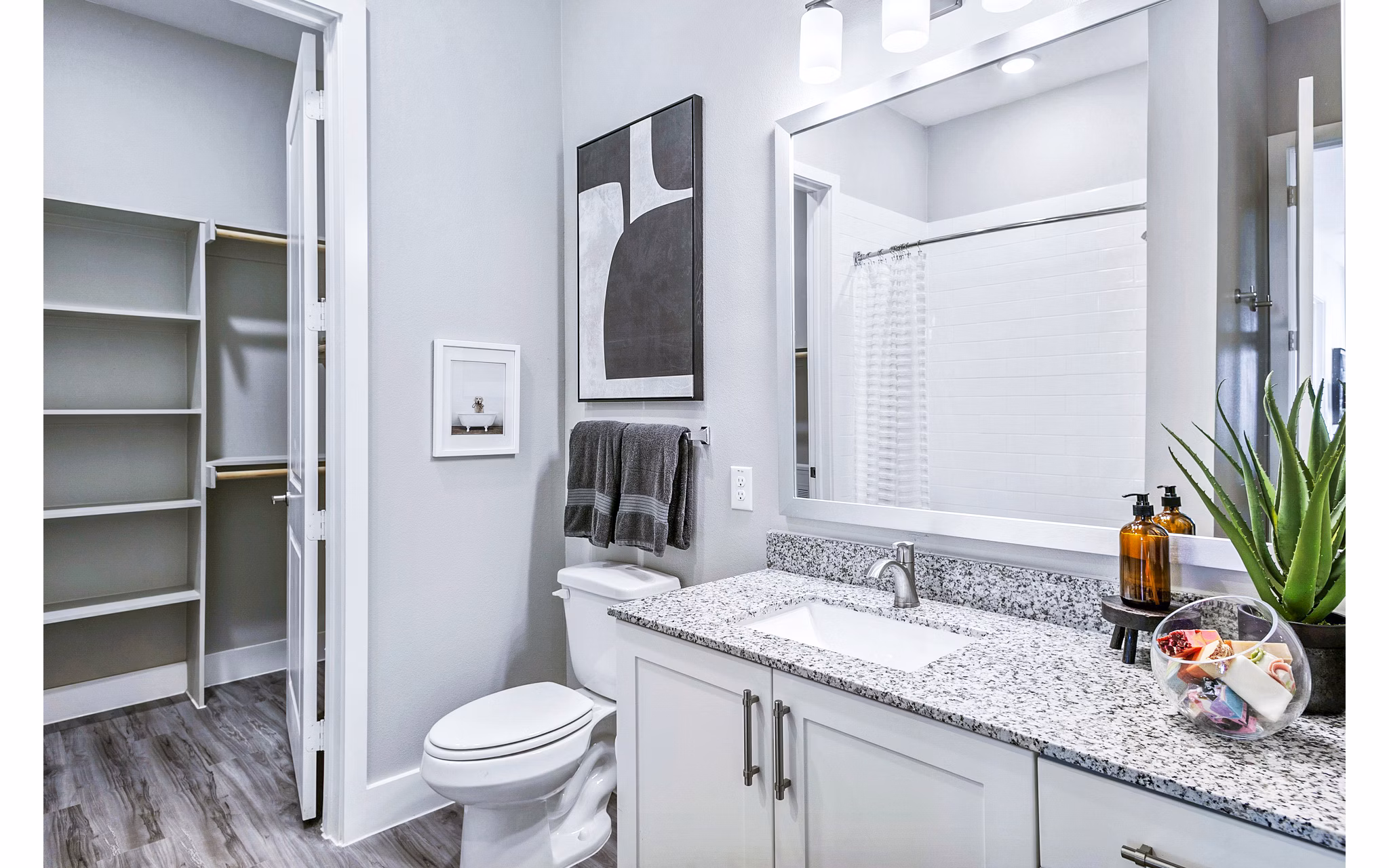 Modern bathroom with luxurious fixtures in The Gin Mill Apartments