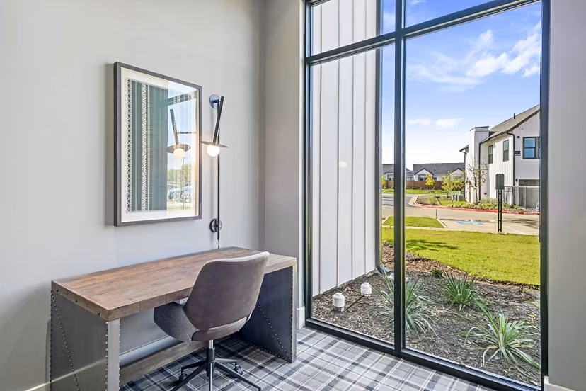 The Gin Mill Apartments: Modern business center and clubhouse with coworking spaces in a luxury apartment community