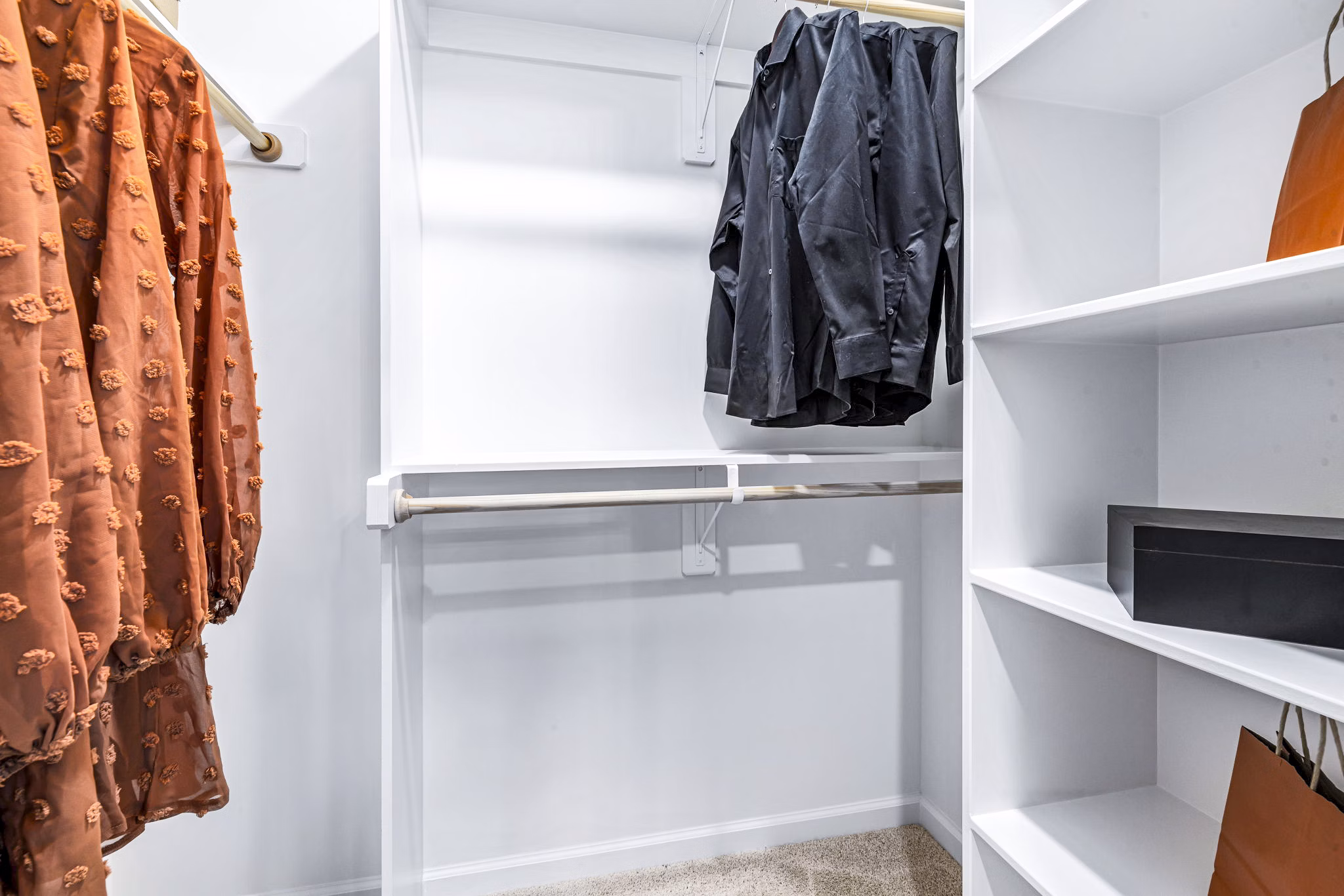 Spacious bedroom closet with ample storage in Abode Kerr Ridge Apartments