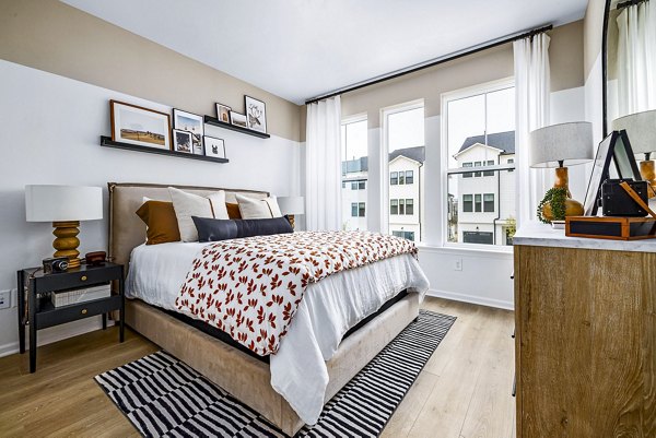 Cozy bedroom with modern decor at Abode Kerr Ridge Apartments