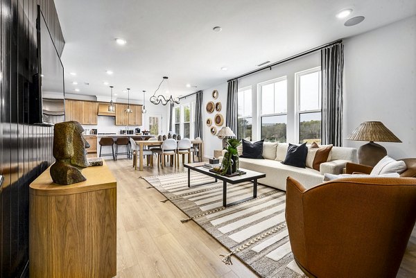 Spacious living room with modern decor in Abode Kerr Ridge Apartments