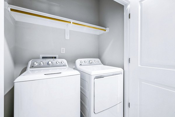 laundry room at Abode Kerr Ridge Apartments