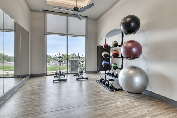 fitness center at Park at Stone Oak Apartments