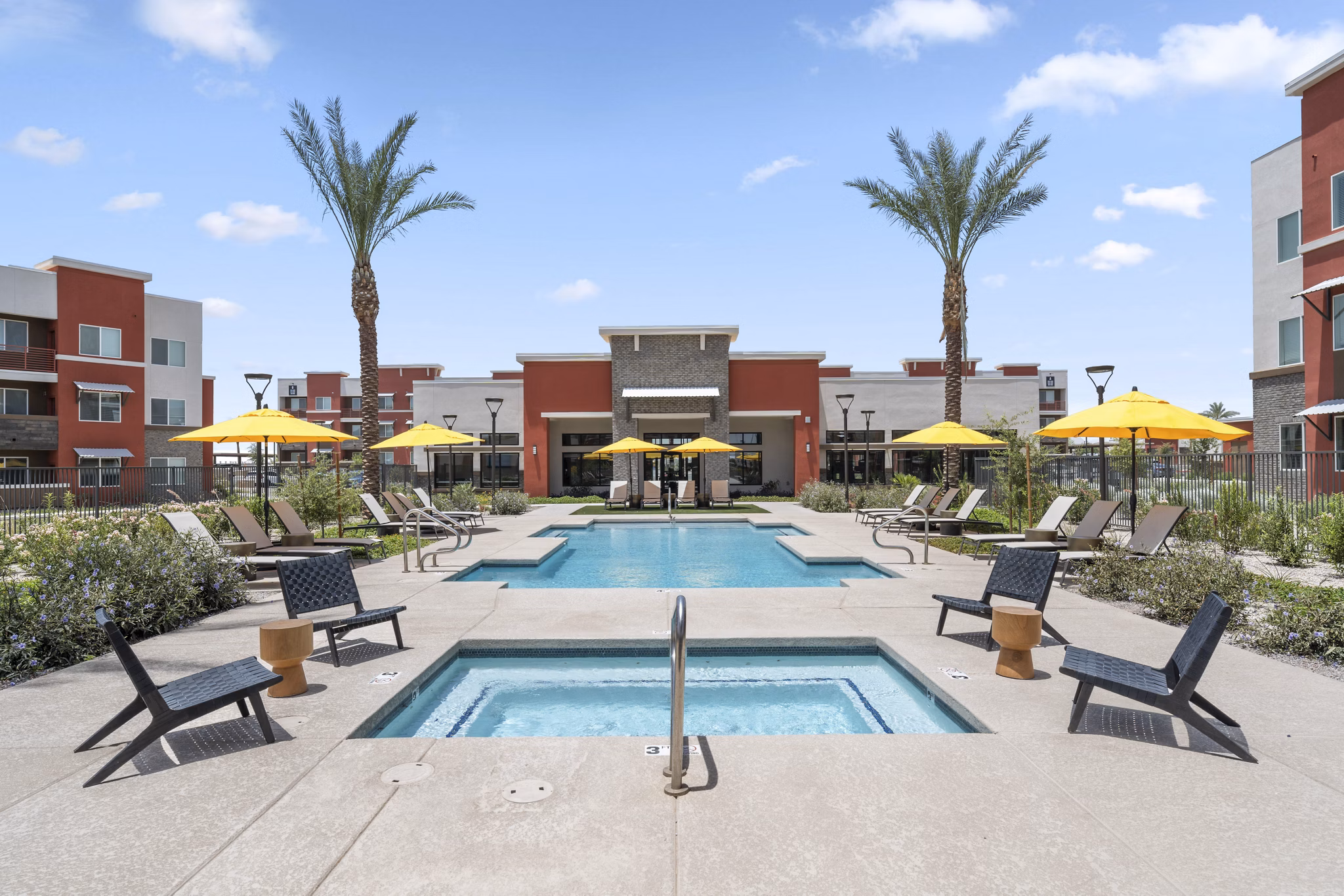 Luxurious pool with spacious lounge area at Prose at Ballpark Village Apartments