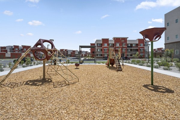 Modern playground at Prose at Ballpark Village Apartments offering fun outdoor activities for residents