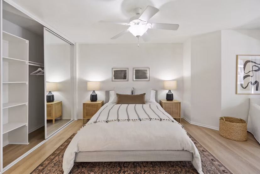 Cozy bedroom with contemporary furnishings at Barcelona Apartments, Greystar luxury living