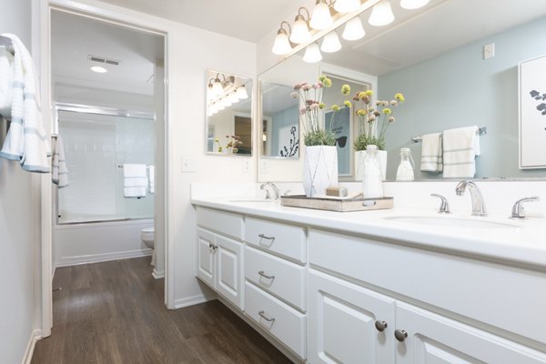 Modern bathroom with marble countertops in Barcelona Apartments featuring luxury finishes