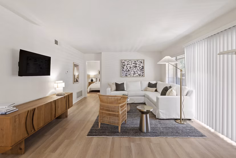 Modern living room with elegant decor in Barcelona Apartments, offering luxury living spaces within the Greystar community
