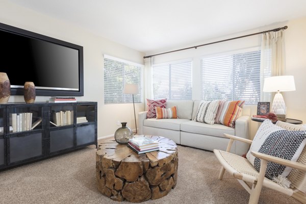 Living room with elegant decor and ample natural light at Barcelona Apartments