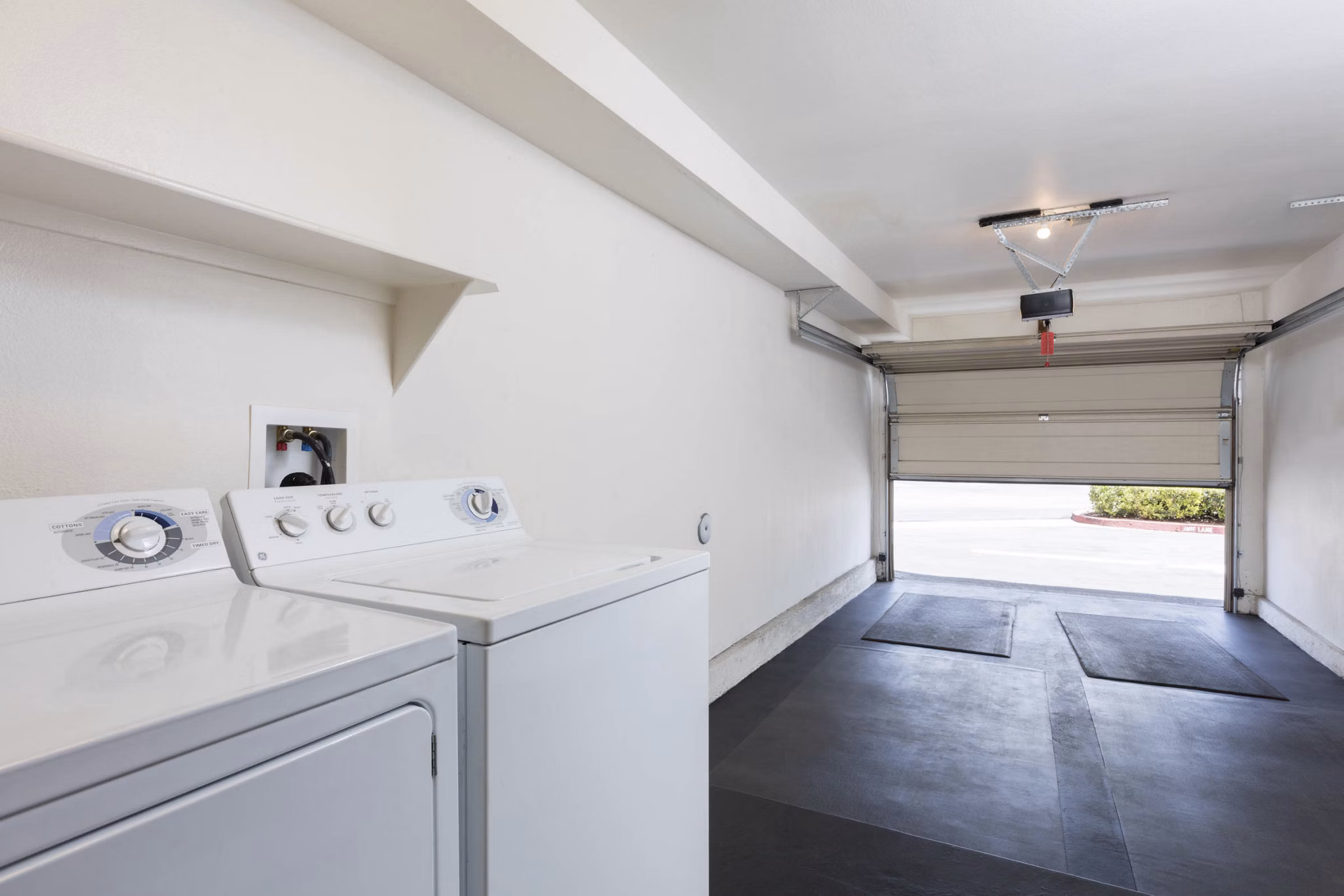 Laundry facilities at Barcelona Apartments: Modern washers and dryers for convenient living