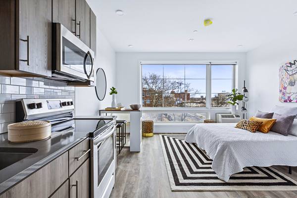 kitchen/bedroom studio at The Quincy Apartments