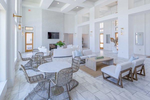 Clubhouse with modern design and seating at The Mark at Denton Apartments