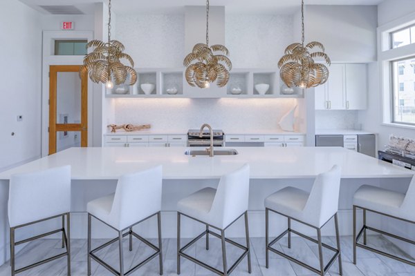 Clubhouse with modern seating and communal spaces at The Mark at Denton Apartments, ideal for resident gatherings and events