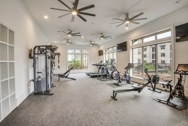 State-of-the-art fitness center featuring modern equipment at The Mark at Denton Apartments