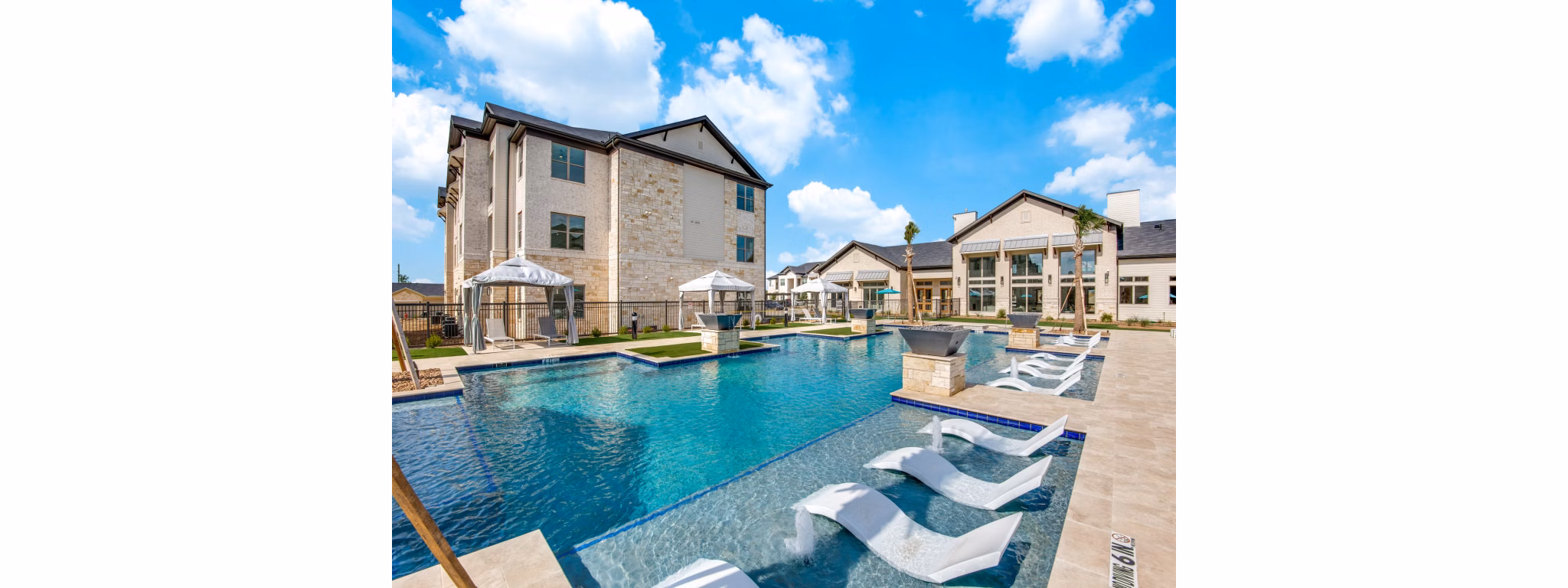Inviting outdoor pool at The Mark at Denton Apartments, perfect for relaxation and leisure Enjoy luxury amenities in this beautiful community