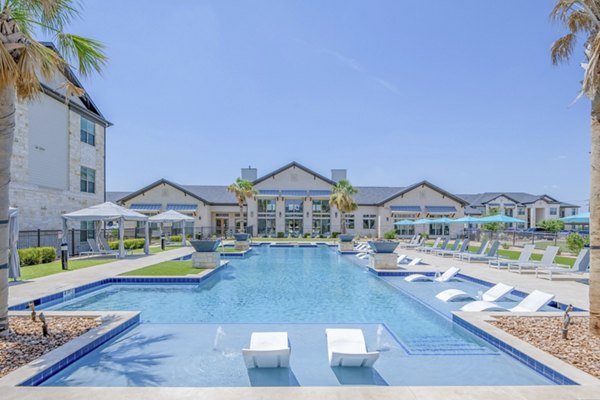 Relaxing pool area at The Mark at Denton Apartments, a Greystar luxury community