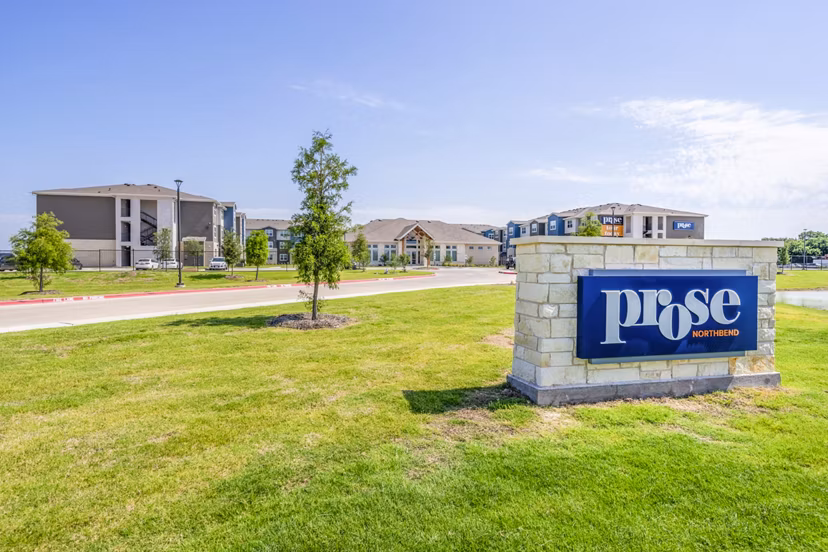 Prose Northbend Apartments: Modern signage at luxury apartments near Northbend's scenic landscapes