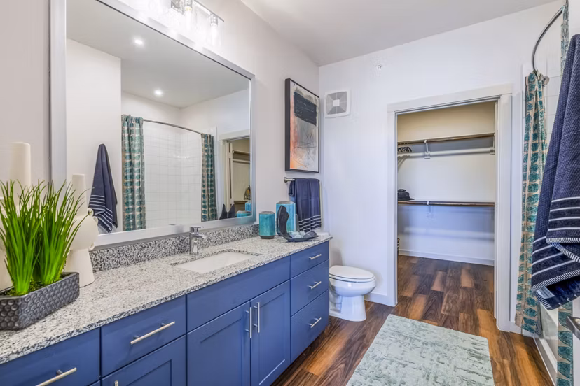 Bathroom with sleek vanity and modern fixtures at Prose Northbend Apartments, Greystar luxury community