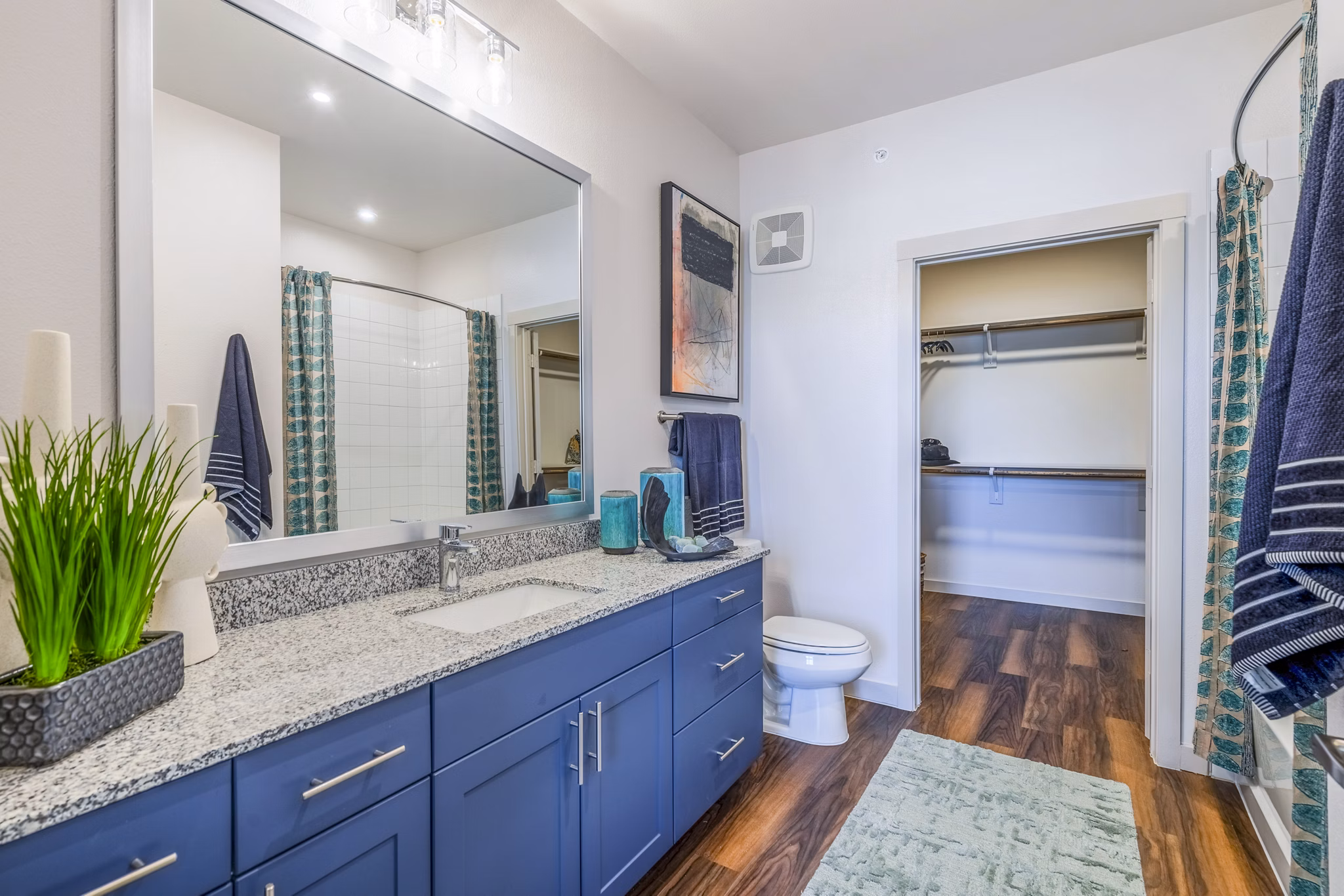 Bathroom with sleek vanity and modern fixtures at Prose Northbend Apartments, Greystar luxury community