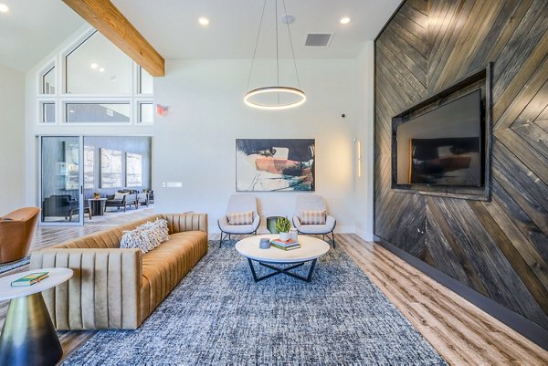 Inviting clubhouse lobby with modern furnishings at Prose Northbend Apartments, offering a luxurious setting for residents and guests