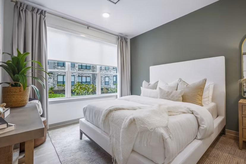 Spacious bedroom with modern decor at Enclave at Raritan Apartments, offering luxurious living spaces for comfort and relaxation