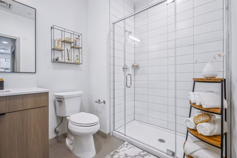 Enclave at Raritan Apartments: Modern bathroom with sleek fixtures and bright lighting