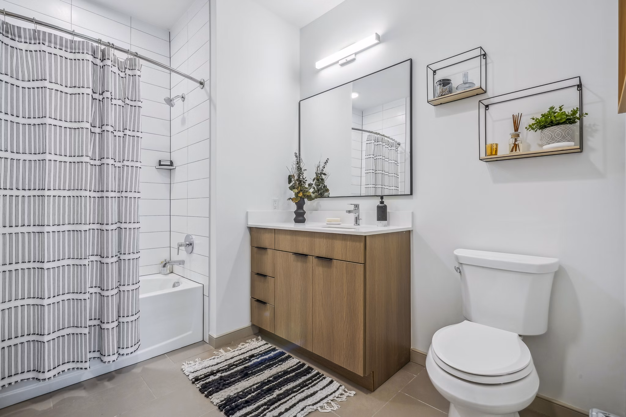 Modern bathroom with sleek fixtures at Enclave at Raritan Apartments