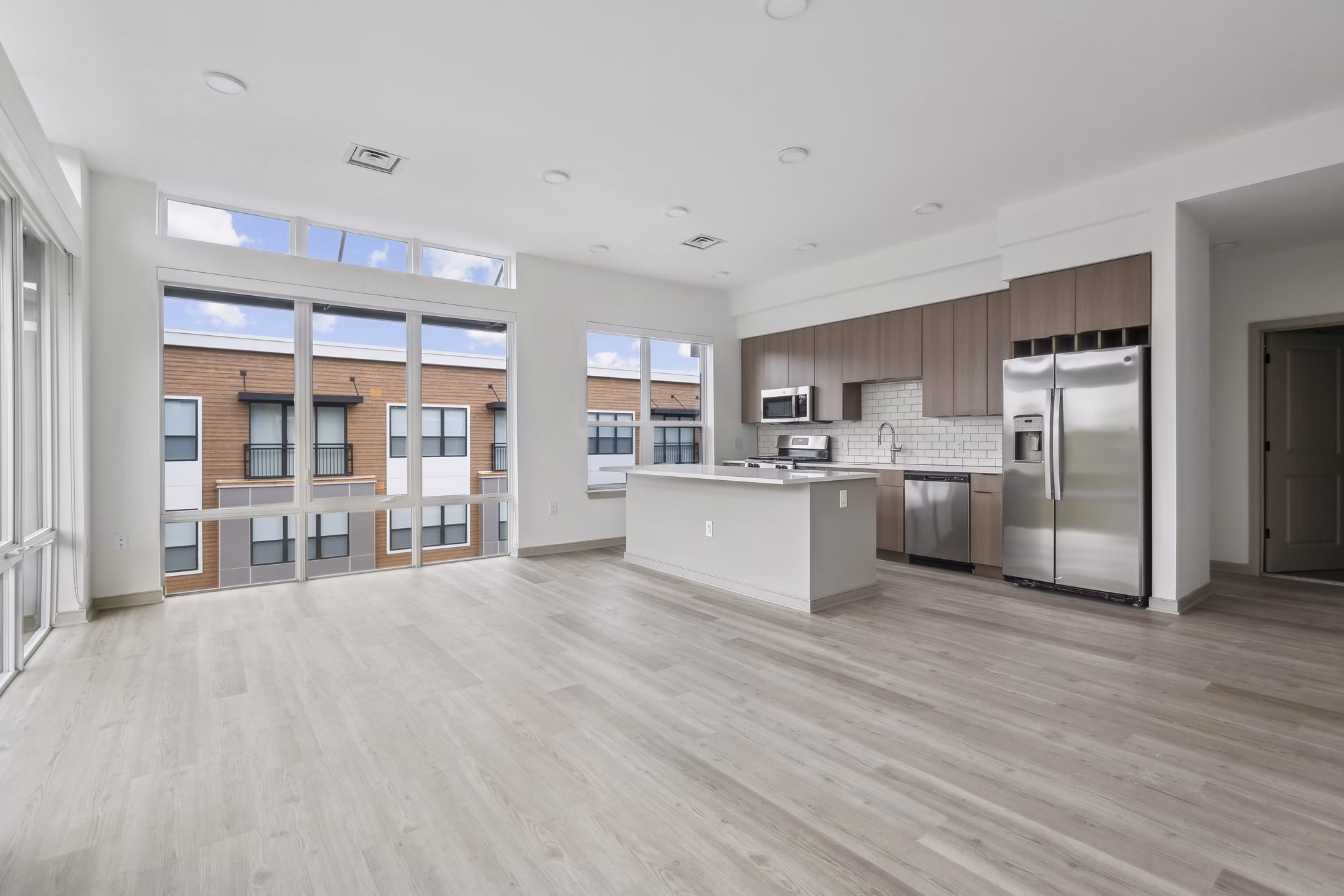 Modern kitchen with stainless steel appliances at Enclave at Raritan Apartments, offering luxury living in a prime location