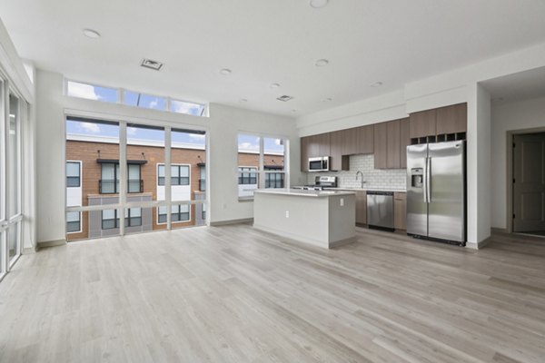 Modern kitchen with stainless steel appliances at Enclave at Raritan Apartments, offering luxury living in a prime location