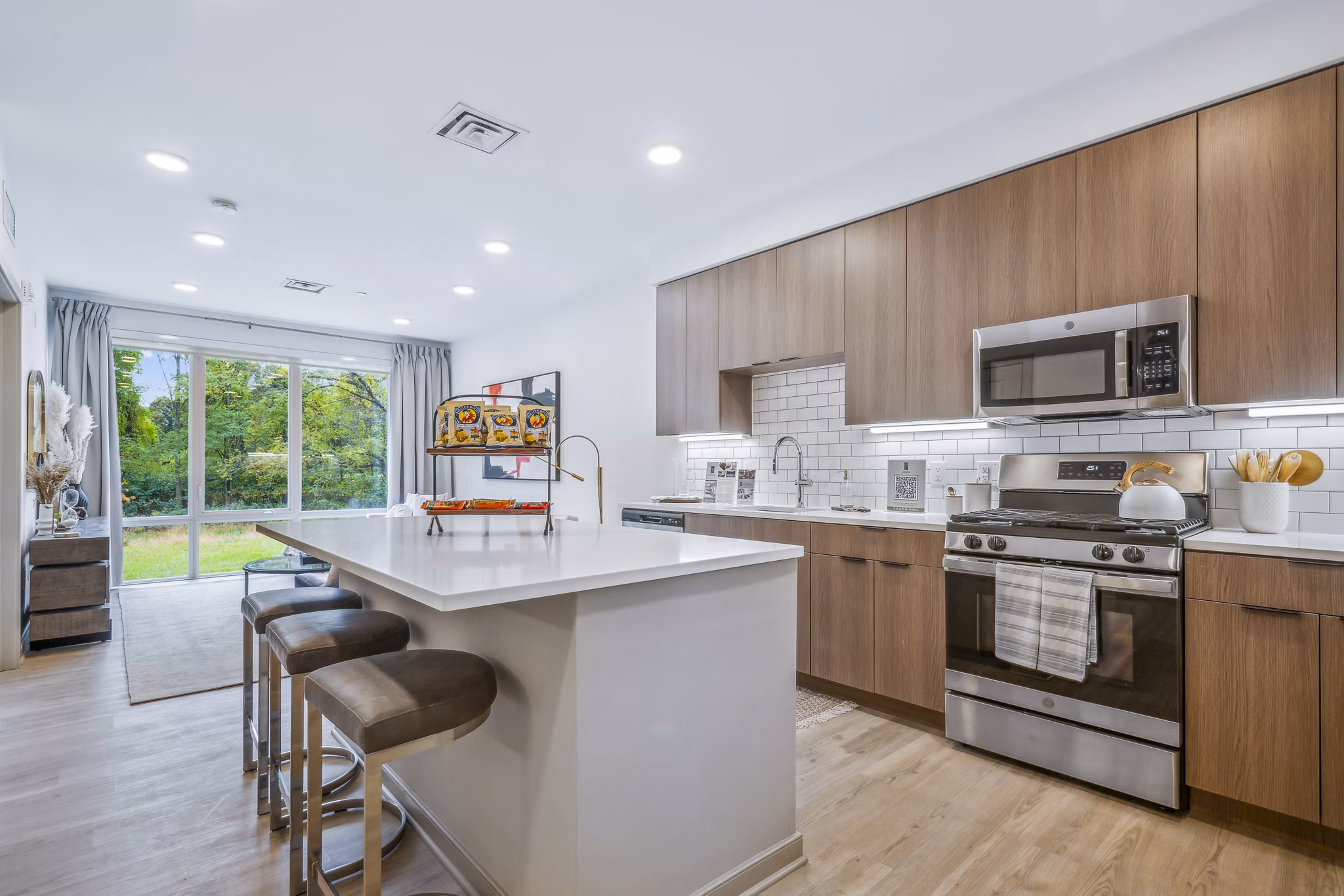 Modern kitchen with sleek countertops and stainless steel appliances at Enclave at Raritan Apartments Ideal for luxury living