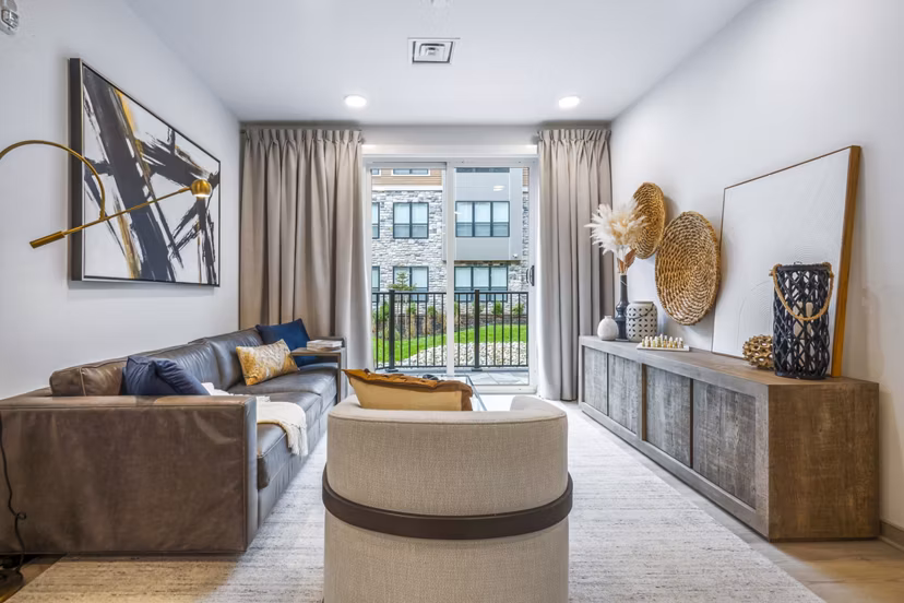 Modern living room with stylish furnishings at Enclave at Raritan Apartments, showcasing luxurious space and comfort in Edison