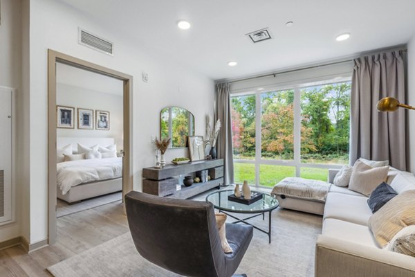 Modern living room with stylish decor in Enclave at Raritan Apartments, luxurious Greystar housing choice