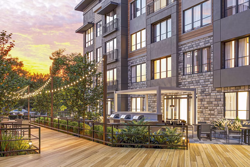 Grill area with outdoor seating at Enclave at Raritan Apartments Enjoy luxury amenities in a vibrant community setting
