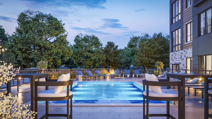 Sparkling outdoor pool at Enclave at Raritan Apartments offering luxury leisure amenities
