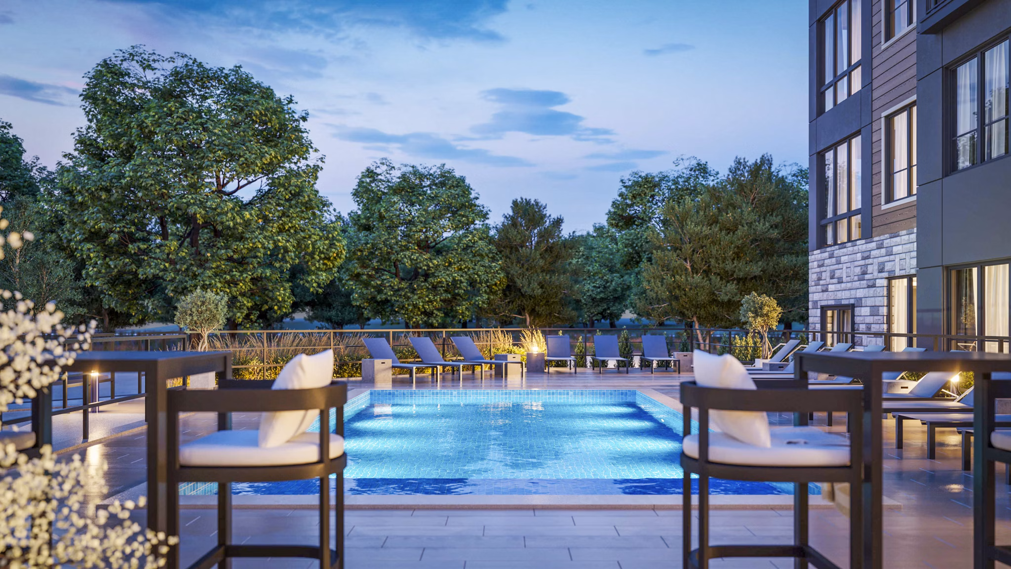 Sparkling outdoor pool at Enclave at Raritan Apartments offering luxury leisure amenities
