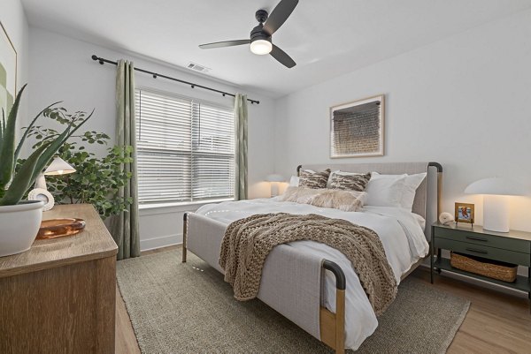 Spacious bedroom with modern decor at The Lindley at Grove 98 Apartments