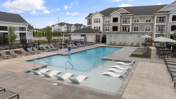 Rooftop pool with city skyline views at The Lindley at Grove 98 Apartments