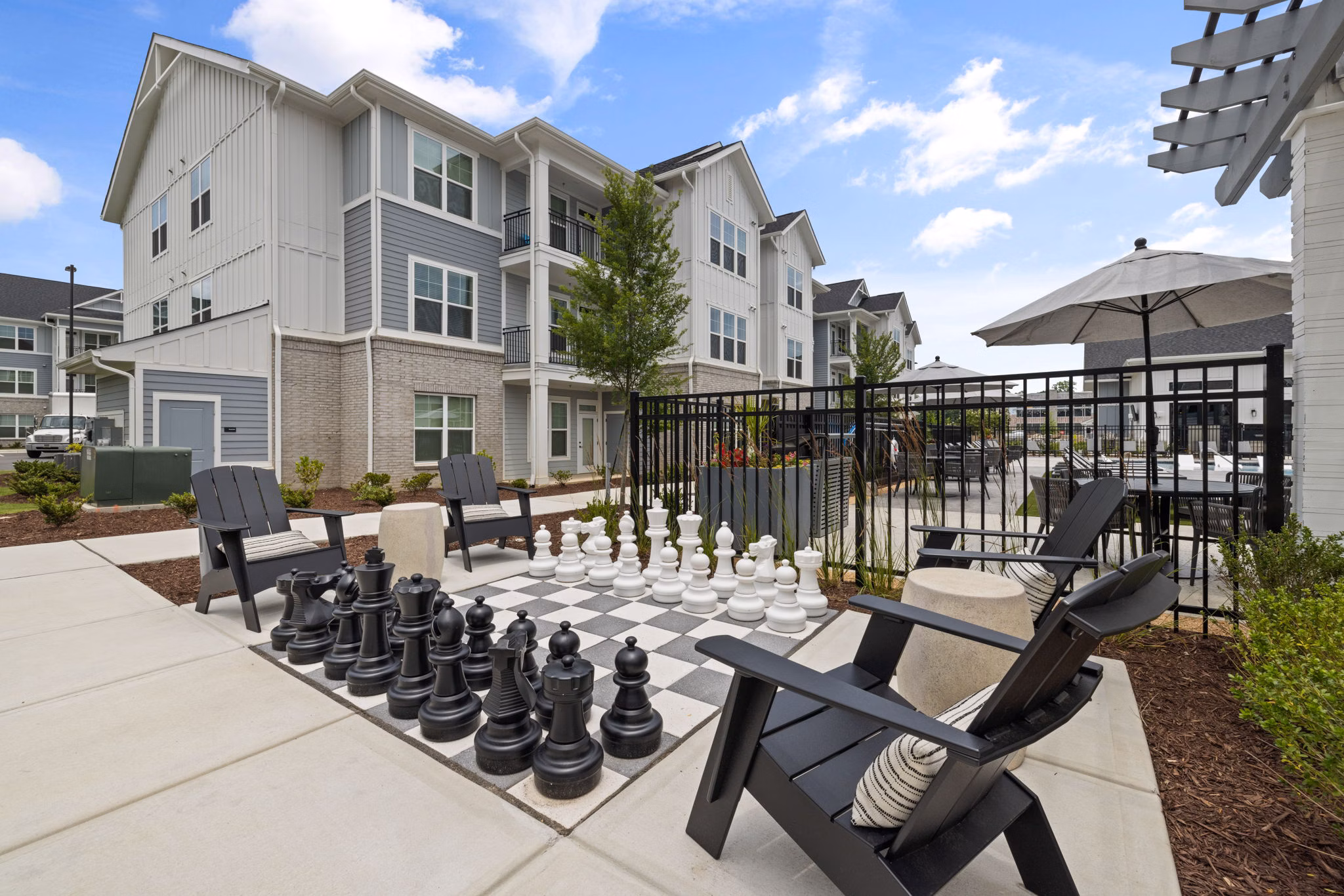 Outdoor sport court at The Lindley at Grove 98 Apartments providing recreational space for residents