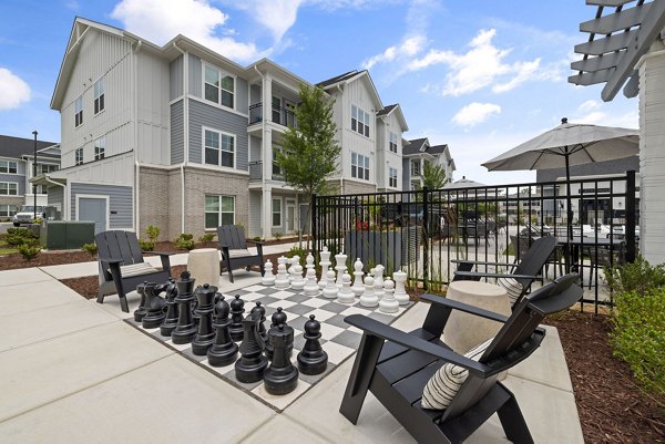 Outdoor sport court at The Lindley at Grove 98 Apartments providing recreational space for residents