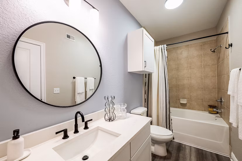 Modern bathroom with sleek fixtures at The Village at Lake Lily Apartments