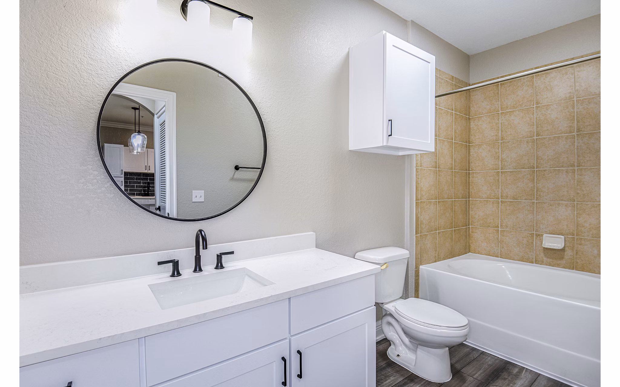 Modern bathroom with sleek fixtures at The Village at Lake Lily Apartments