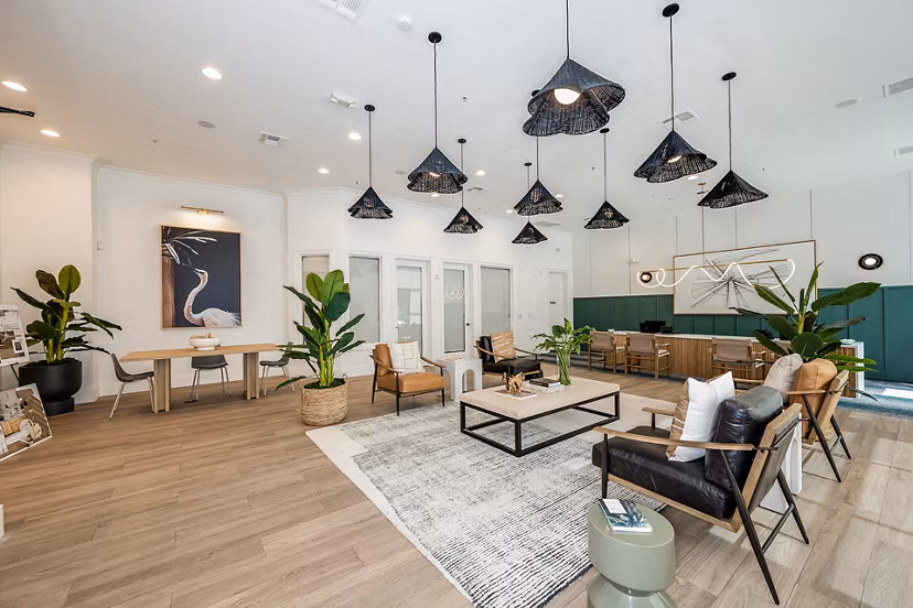 Modern clubhouse game room featuring billiards table at The Village at Lake Lily Apartments, a luxury community
