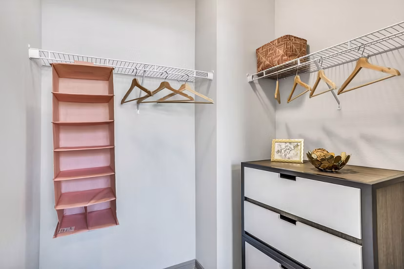 Cozy bedroom with modern decor at Haven at M Apartments