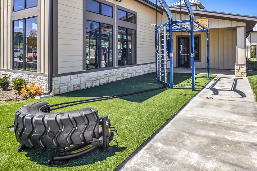 Outdoor fitness center for residents at Haven at M Apartments, featuring modern exercise equipment and spacious workout area, enhancing active lifestyle options
