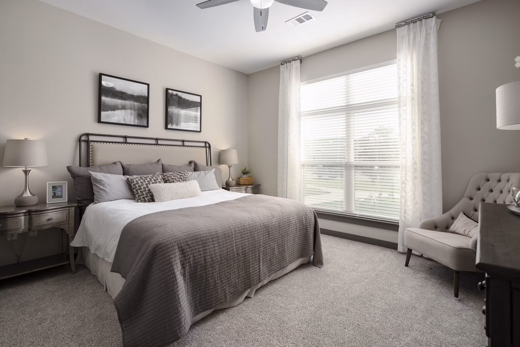 Cozy bedroom with modern decor at Sterling at Stonecrest Apartments