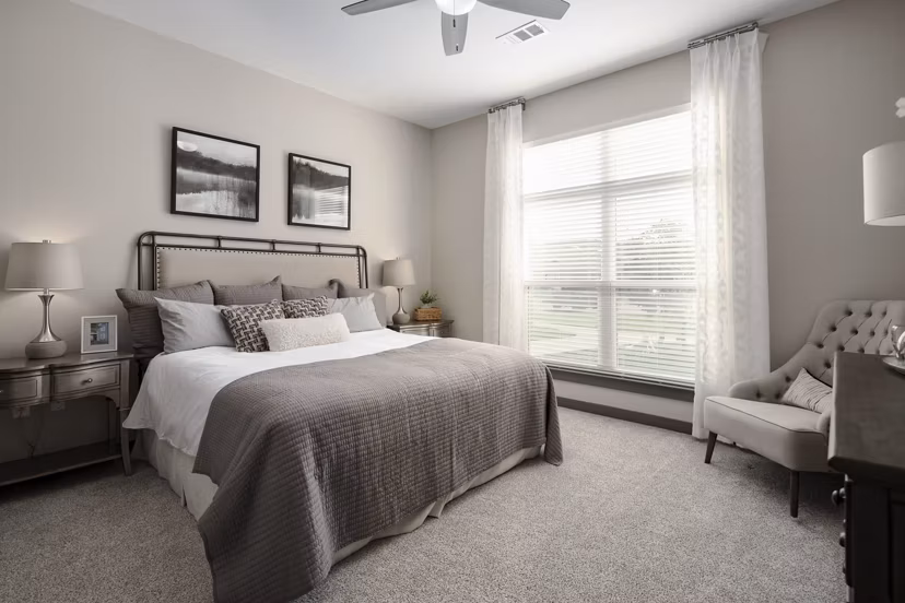 Cozy bedroom with modern decor at Sterling at Stonecrest Apartments