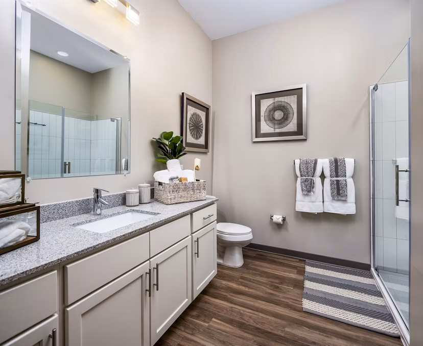 Modern bathroom with sleek fixtures at Sterling at Stonecrest Apartments, offering luxury living in a premium Greystar community