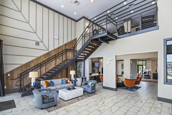 Luxurious clubhouse with modern seating area at Sterling at Stonecrest Apartments