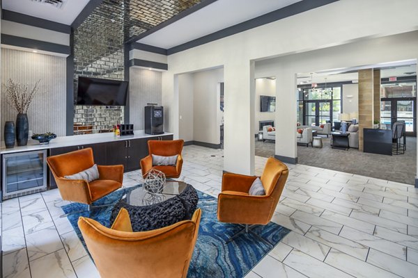 Modern clubhouse lobby with elegant decor at Sterling at Stonecrest Apartments Perfect for socializing and relaxation