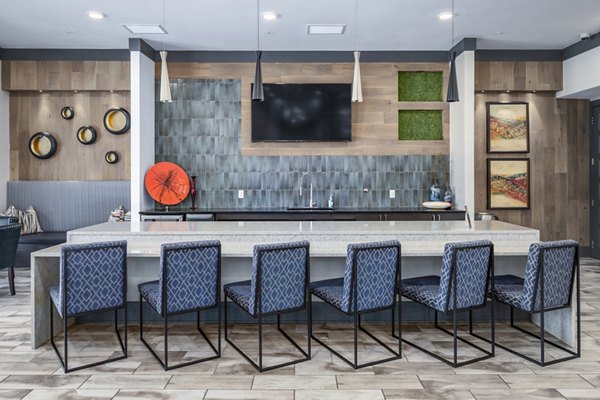 Stylish clubhouse with lounge seating at Sterling at Stonecrest Apartments